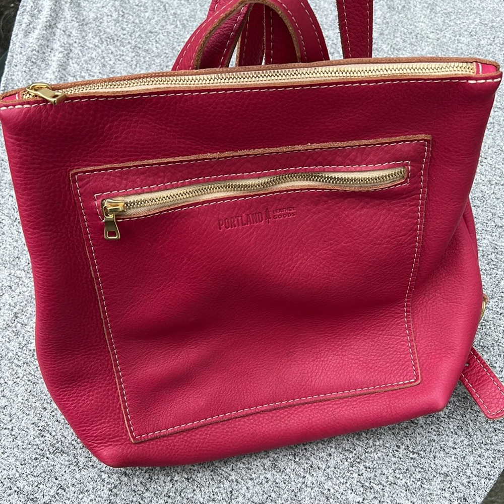 Portland Leather Goods Tote Backpack in color pomegranate.